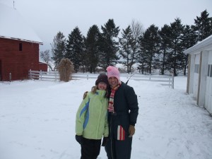 My niece and I in 2010...I'm in my mom's old snow suit and am an adult version of the mis-matched kid from my above story. :)