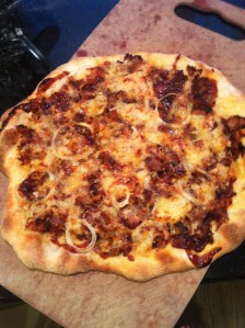 BBQ pork pizza with gouda, cilantro and Vidalia onions.