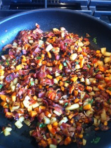 Sweet potato hash (sweet and russet potatoes, bacon, pepperoni, onion, sweet pepper, jalapeno, cilantro, grape tomatoes)